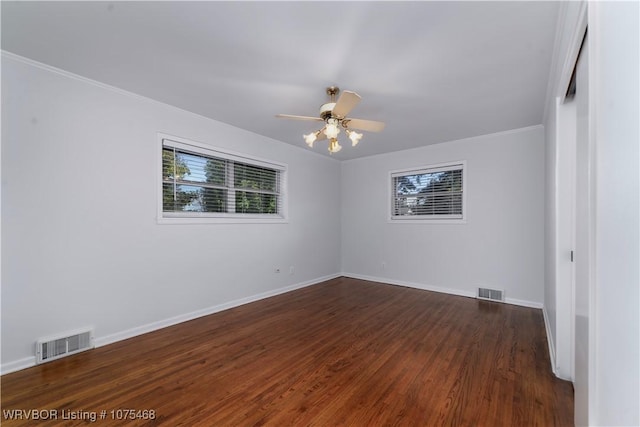 unfurnished room featuring ceiling fan and dark hardwood / wood-style flooring