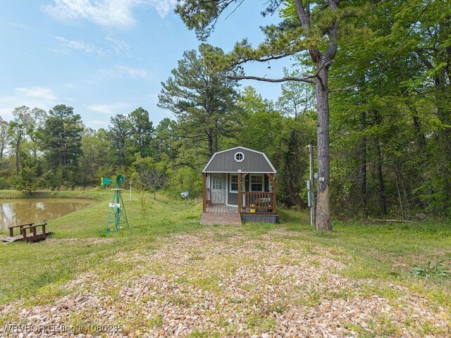 5914 Asa Craig Rd, Greenwood, AR 72936 - view of yard with a water view, a forest view, and an outbuilding