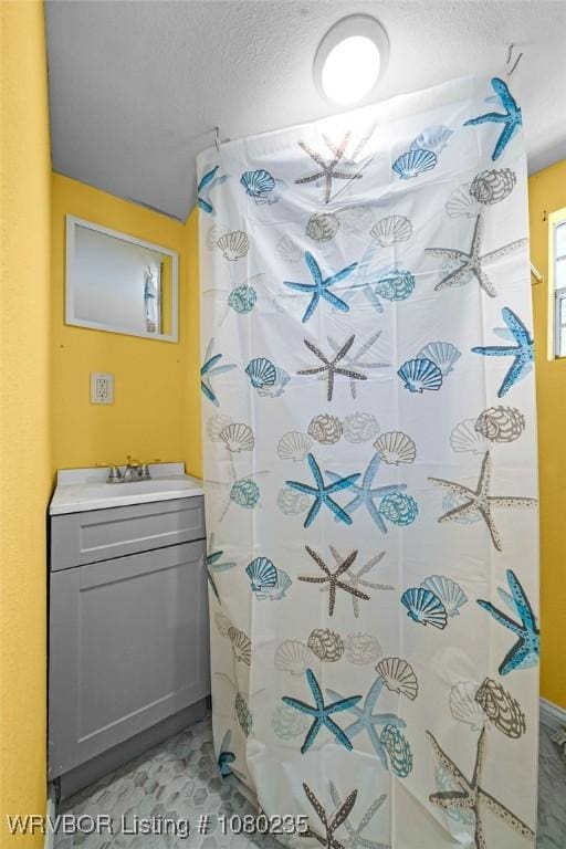 5914 Asa Craig Rd, Greenwood, AR 72936 - full bath with curtained shower, vanity, and a textured ceiling