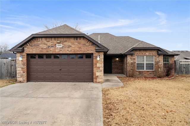 view of front of home with a garage