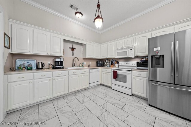 1318 Taos Dr, Van Buren, AR 72956 - kitchen featuring white appliances, crown molding, light marble finish floors, and white cabinets