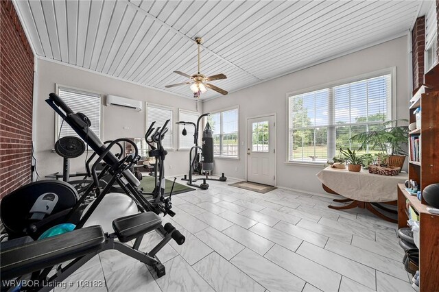 1318 Taos Dr, Van Buren, AR 72956 - workout room featuring a wall mounted AC and a ceiling fan