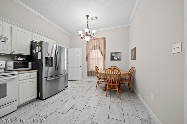 1318 Taos Dr, Van Buren, AR 72956 - kitchen featuring white appliances, light marble finish flooring, a chandelier, white cabinets, and ornamental molding