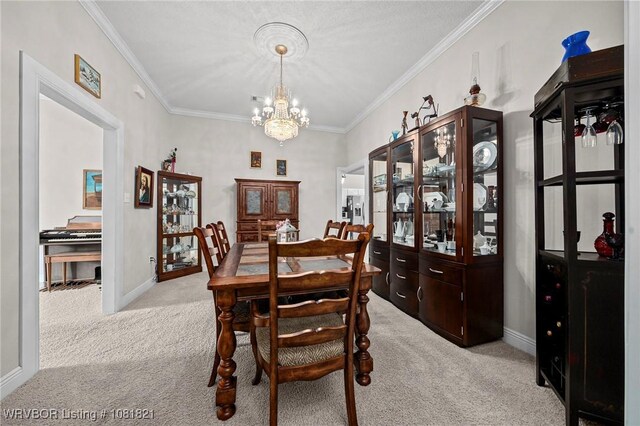 1318 Taos Dr, Van Buren, AR 72956 - dining space featuring light carpet, a chandelier, and ornamental molding