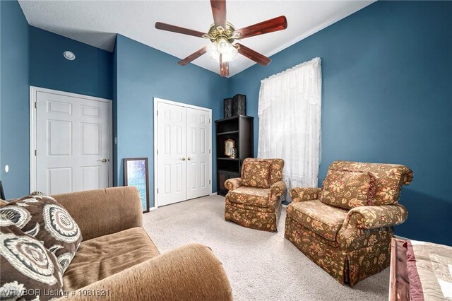 1318 Taos Dr, Van Buren, AR 72956 - living area featuring carpet floors and a ceiling fan
