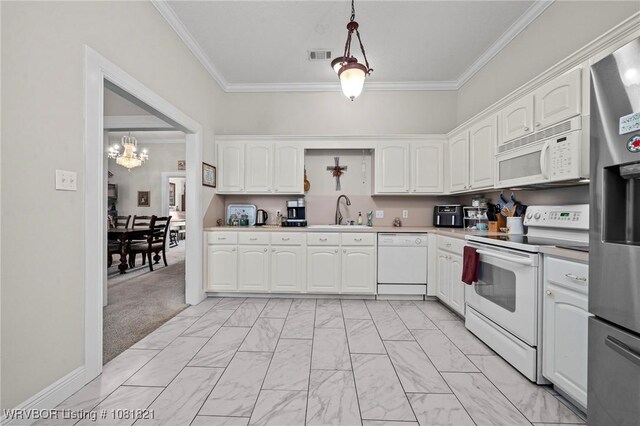 1318 Taos Dr, Van Buren, AR 72956 - kitchen with white appliances, a chandelier, light marble finish flooring, crown molding, and white cabinets