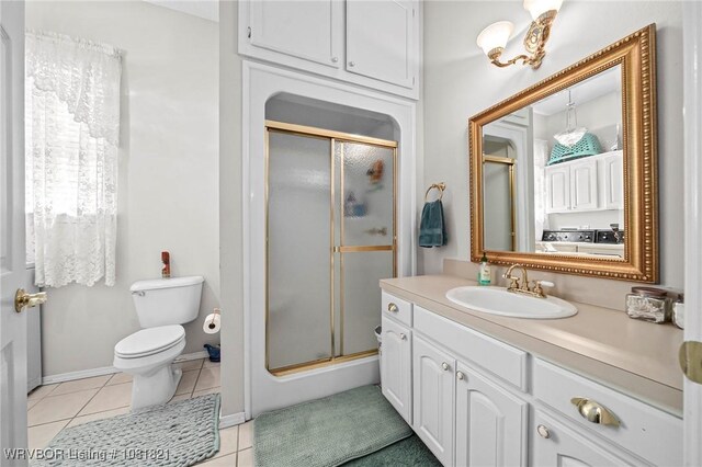 1318 Taos Dr, Van Buren, AR 72956 - full bath featuring vanity, a shower stall, and tile patterned floors