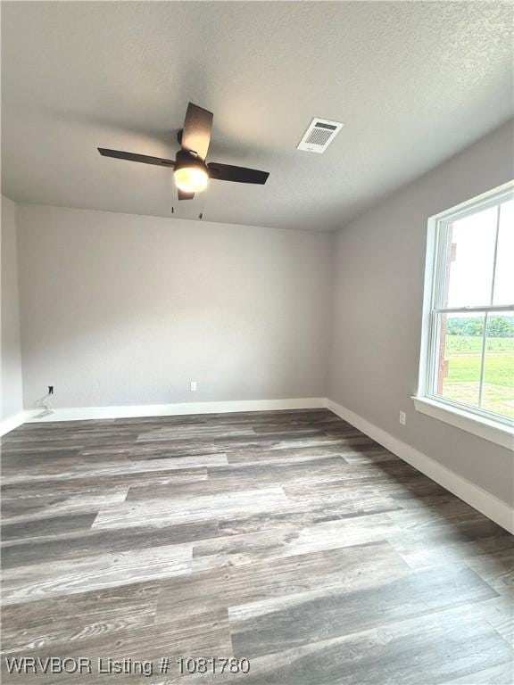 2948 N Hwy 282, Van Buren, AR 72956 - spare room with wood finished floors and a ceiling fan