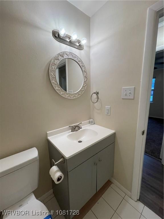 123 Gamma Cir, Roland, OK 74954 - bathroom with vanity and tile patterned flooring