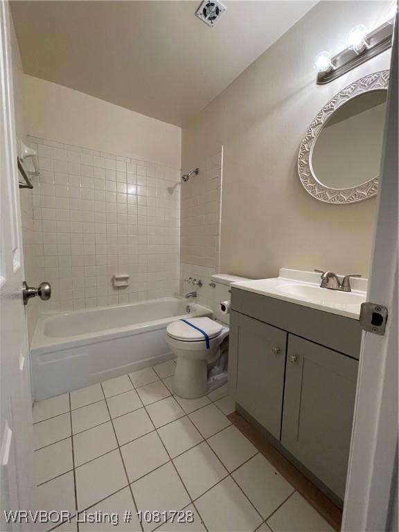 123 Gamma Cir, Roland, OK 74954 - bathroom featuring tile patterned flooring, vanity, and bathtub / shower combination