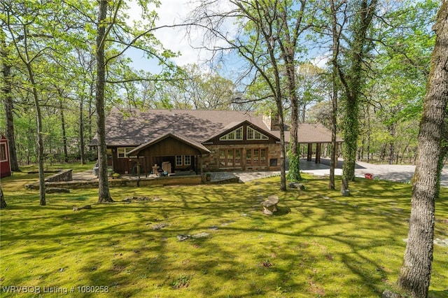 517 Ross Hampton Rd, Hackett, AR 72937 - view of front of property with a shingled roof and a front lawn