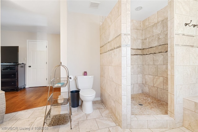 517 Ross Hampton Rd, Hackett, AR 72937 - full bathroom with toilet, visible vents, walk in shower, and wood finished floors