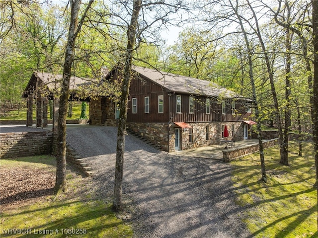 517 Ross Hampton Rd, Hackett, AR 72937 - view of front of home featuring gravel driveway and stone siding