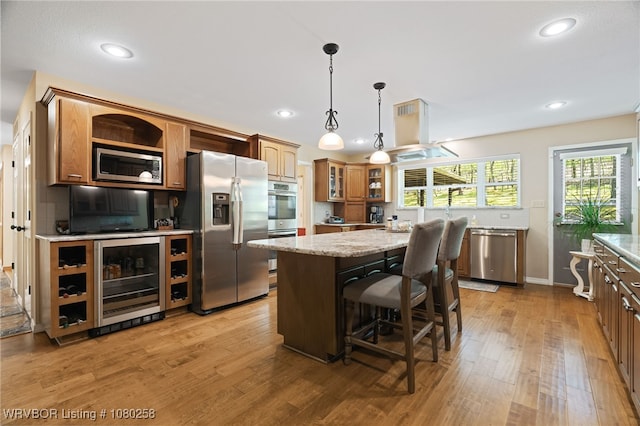 517 Ross Hampton Rd, Hackett, AR 72937 - kitchen with glass insert cabinets, light wood-style flooring, a center island, appliances with stainless steel finishes, and wine cooler