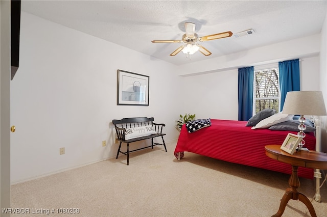 517 Ross Hampton Rd, Hackett, AR 72937 - carpeted bedroom with a ceiling fan and visible vents