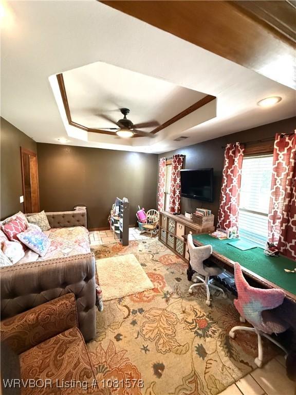 417 N Rattlesnake Rd, Charleston, AR 72933 - living area with a tray ceiling and ceiling fan