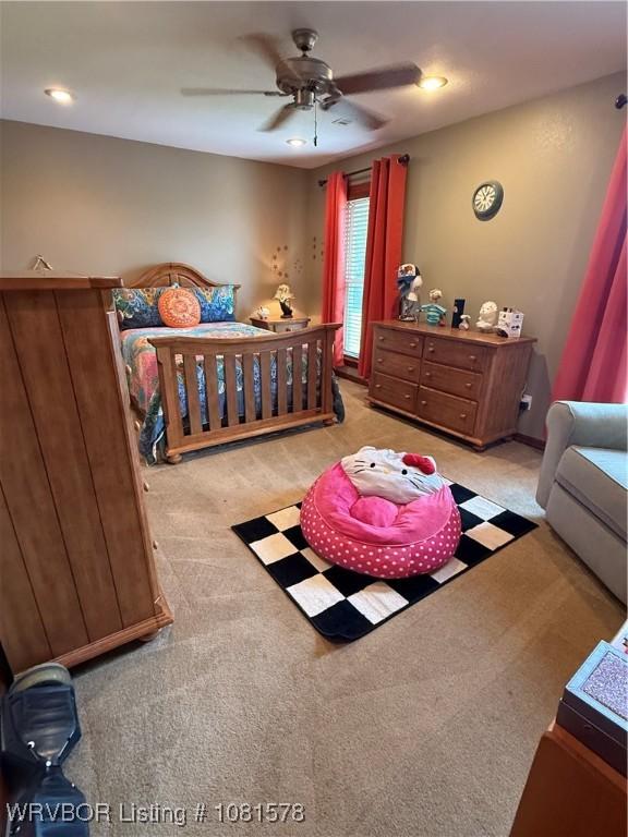 417 N Rattlesnake Rd, Charleston, AR 72933 - bedroom with carpet, a ceiling fan, and recessed lighting