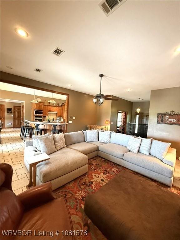 417 N Rattlesnake Rd, Charleston, AR 72933 - living area featuring a ceiling fan and recessed lighting