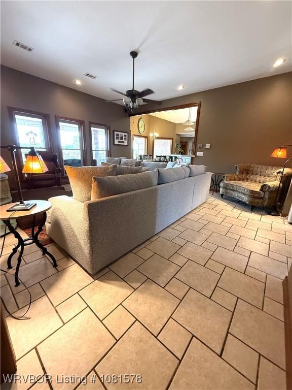 417 N Rattlesnake Rd, Charleston, AR 72933 - living room with a ceiling fan, recessed lighting, and light tile patterned floors