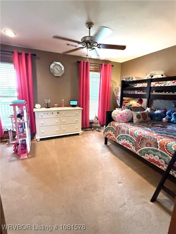 417 N Rattlesnake Rd, Charleston, AR 72933 - carpeted bedroom featuring ceiling fan