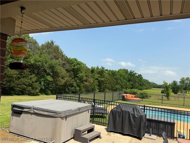 417 N Rattlesnake Rd, Charleston, AR 72933 - view of patio with a hot tub and grilling area
