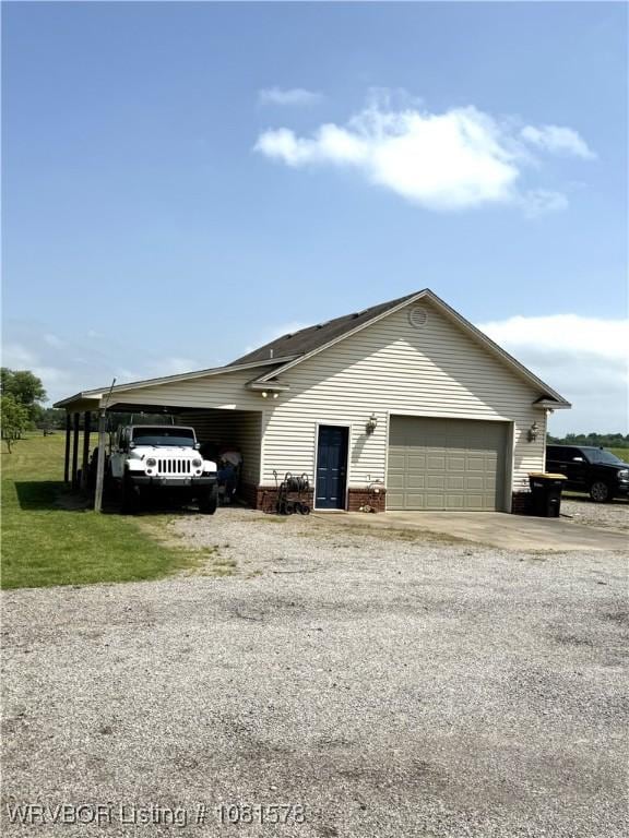 417 N Rattlesnake Rd, Charleston, AR 72933 - garage featuring driveway