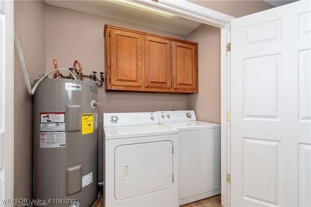 108 Wilson Ave, Poteau, OK 74953 - laundry area featuring cabinet space, water heater, and washer and clothes dryer
