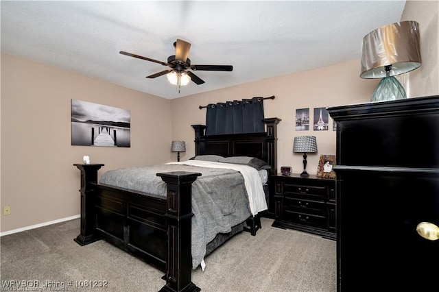 108 Wilson Ave, Poteau, OK 74953 - carpeted bedroom with baseboards and a ceiling fan
