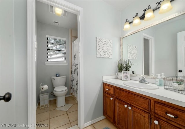 bathroom with toilet, tile patterned floors, visible vents, baseboards, and vanity