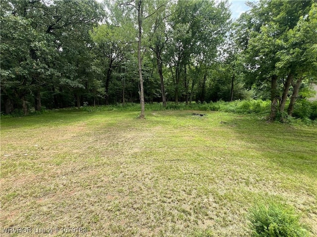 4923 Red Hill Rd, Alma, AR 72921 - view of green lawn with a wooded view