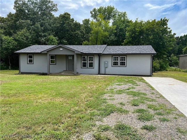 4923 Red Hill Rd, Alma, AR 72921 - single story home featuring a front yard, stucco siding, and driveway