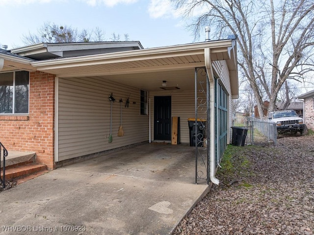 exterior space with a carport