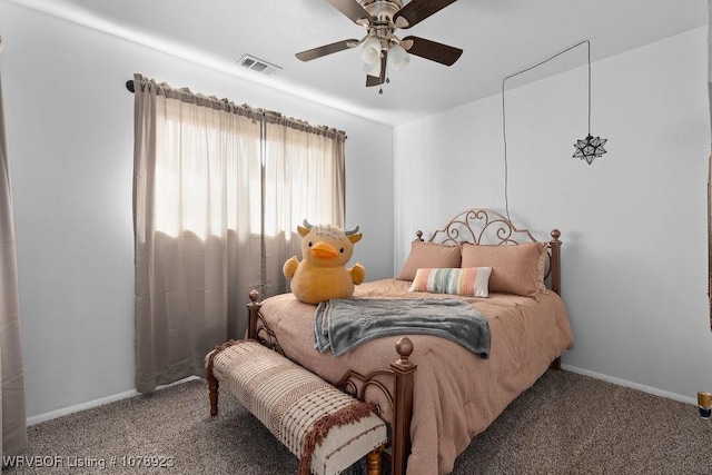 bedroom with ceiling fan and carpet