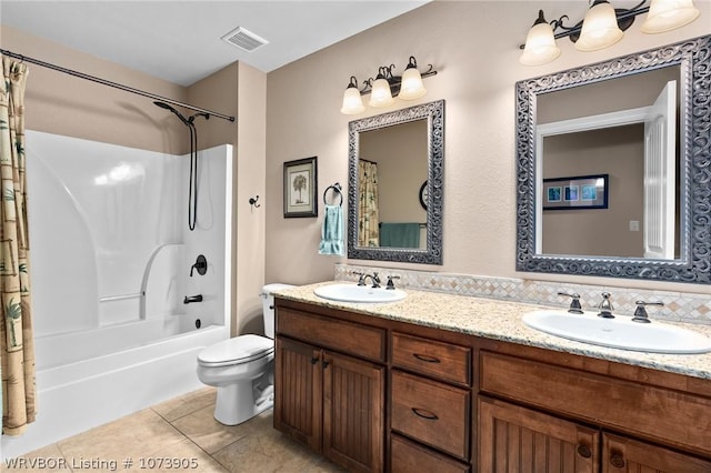 full bathroom with tile patterned floors, vanity, toilet, and shower / bathtub combination with curtain