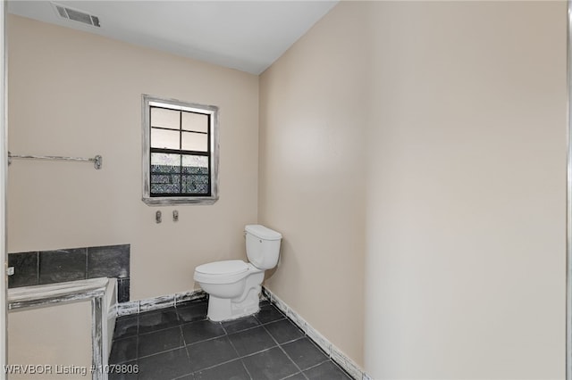 475616 E 1060th Rd, Muldrow, OK 74948 - half bathroom featuring toilet, baseboards, tile patterned flooring, and visible vents