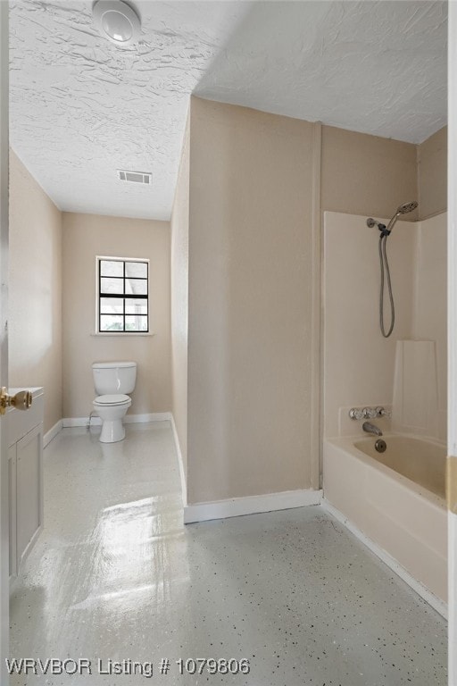 475616 E 1060th Rd, Muldrow, OK 74948 - full bath with toilet, baseboards, a textured ceiling, visible vents, and shower / bathtub combination