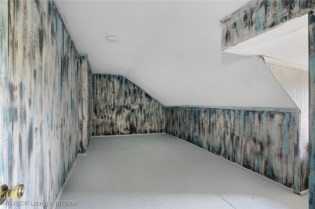 475616 E 1060th Rd, Muldrow, OK 74948 - bonus room featuring wood walls and vaulted ceiling