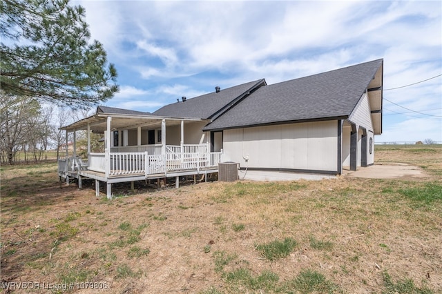 475616 E 1060th Rd, Muldrow, OK 74948 - back of house with central AC unit, a porch, and roof with shingles