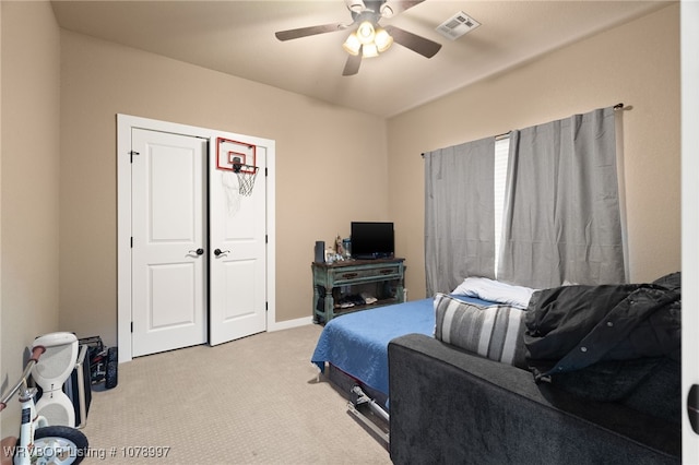 carpeted bedroom featuring ceiling fan