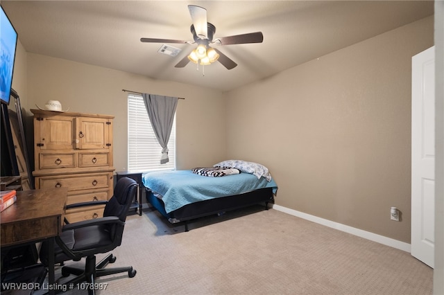 bedroom with light colored carpet and ceiling fan