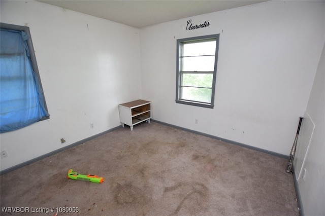 1126 S 2nd St, Stilwell, OK 74960 - unfurnished room featuring carpet and baseboards
