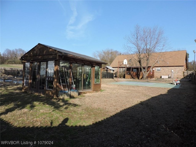 view of yard featuring a pool and a patio