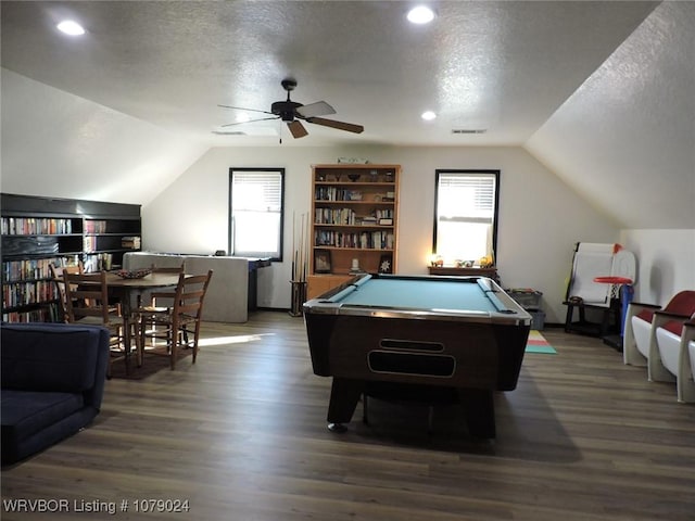 rec room featuring billiards, dark hardwood / wood-style flooring, vaulted ceiling, and a textured ceiling