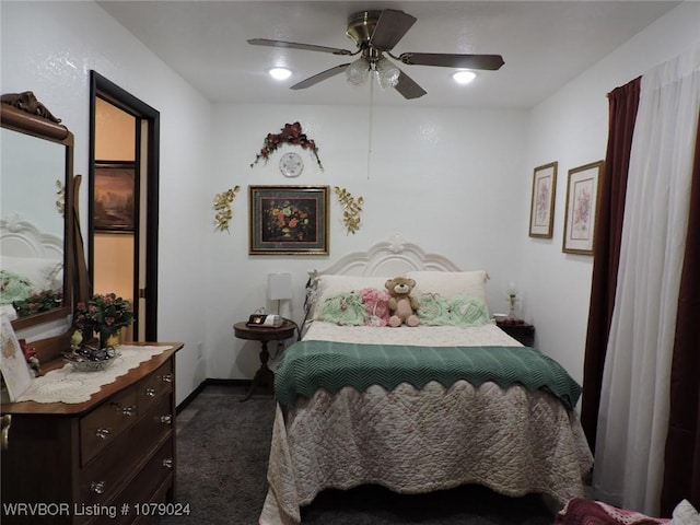 carpeted bedroom featuring ceiling fan