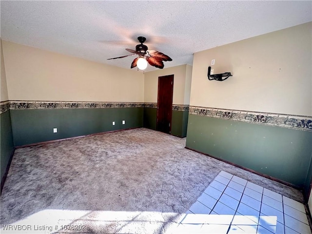 306 Ellis Loop, Pocola, OK 74902 - spare room with light carpet, a textured ceiling, and ceiling fan