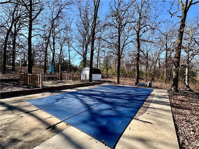306 Ellis Loop, Pocola, OK 74902 - view of swimming pool with a shed