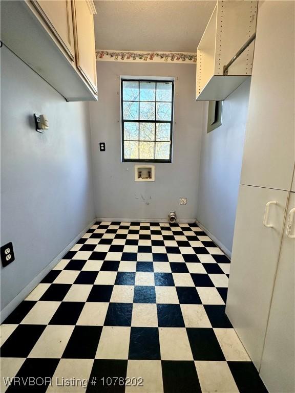 306 Ellis Loop, Pocola, OK 74902 - laundry room with cabinets and washer hookup