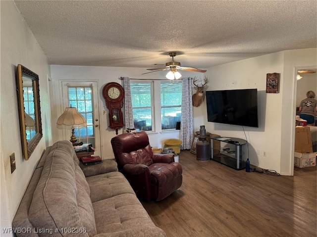 30 Easley Loop, Greenwood, AR 72936 - living room featuring a ceiling fan, a textured ceiling, and wood finished floors