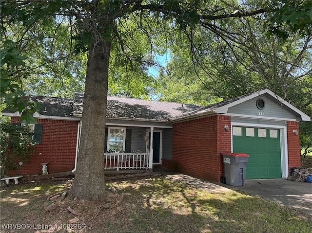 30 Easley Loop, Greenwood, AR 72936 - ranch-style home featuring an attached garage, covered porch, brick siding, and driveway