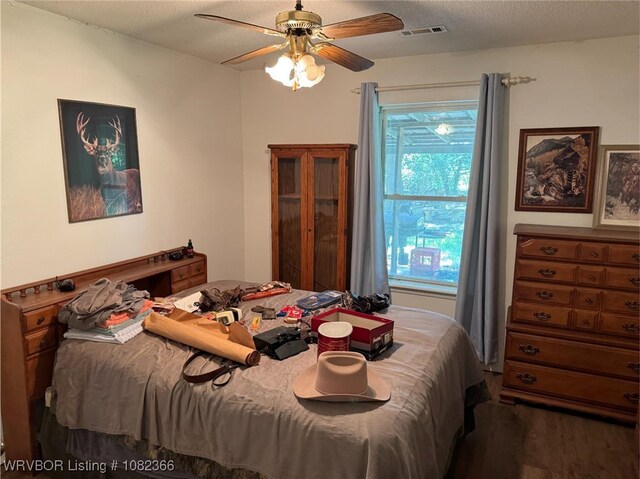 30 Easley Loop, Greenwood, AR 72936 - bedroom featuring wood finished floors and ceiling fan